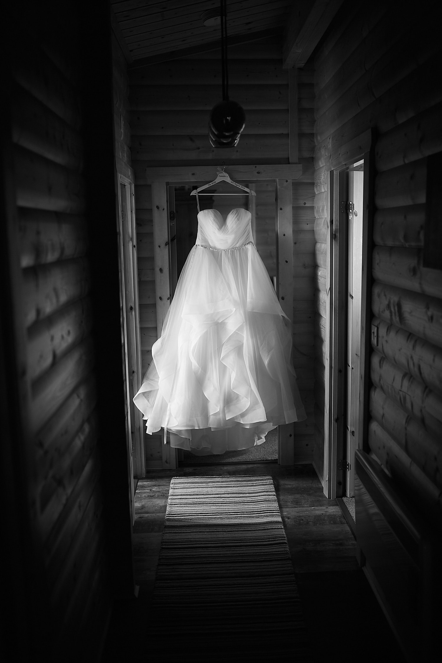 A wedding dress hanging in a Lodge at Kenwick Park Louth