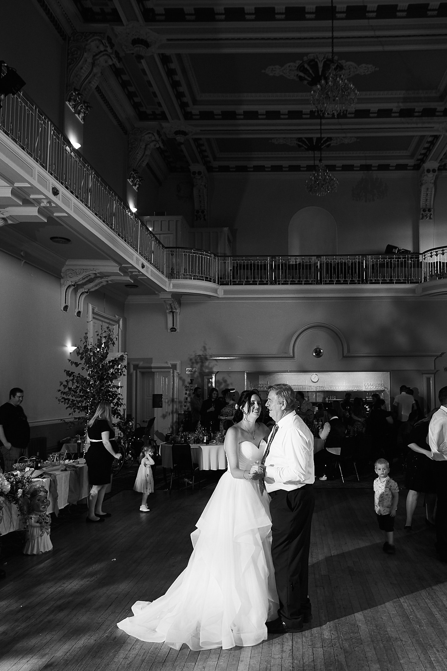 A father and his daughter share a dance on her wedding day