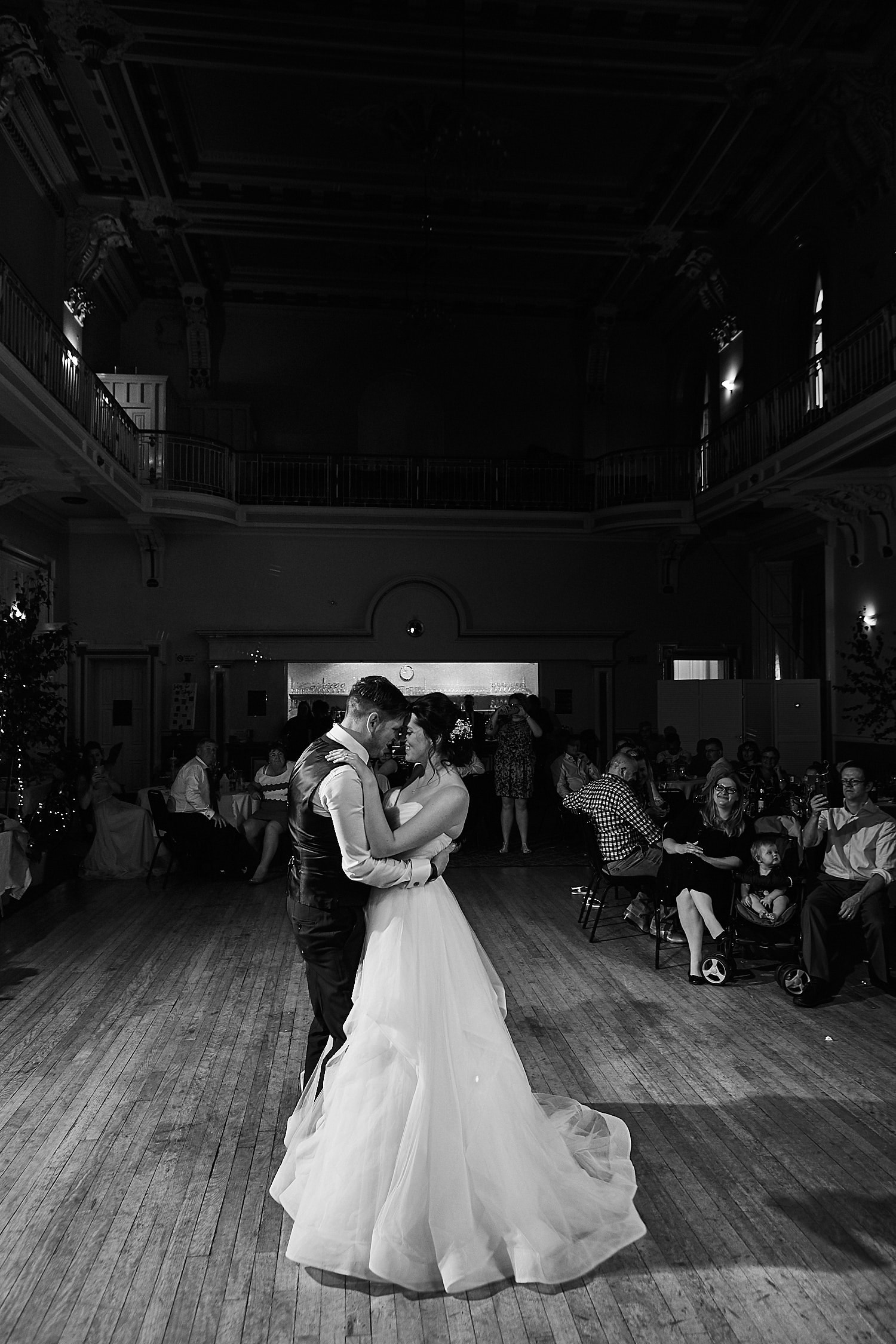 A couple share their first dance on their wedding day