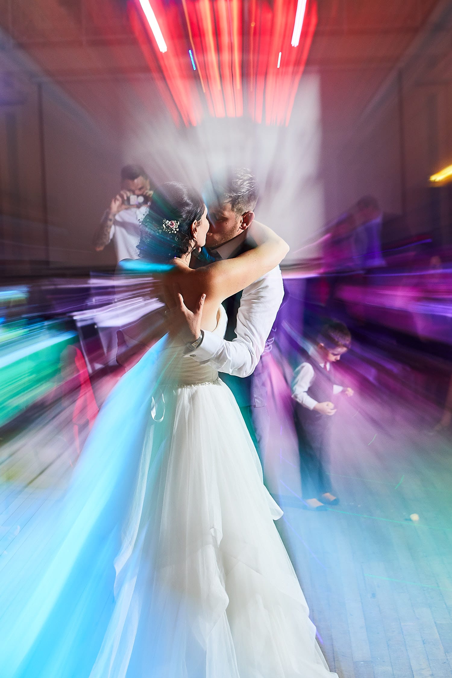 A couple kiss on the dance floor on their wedding day in Louth