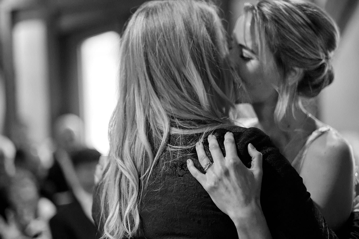 A same sex couple kiss as the become married