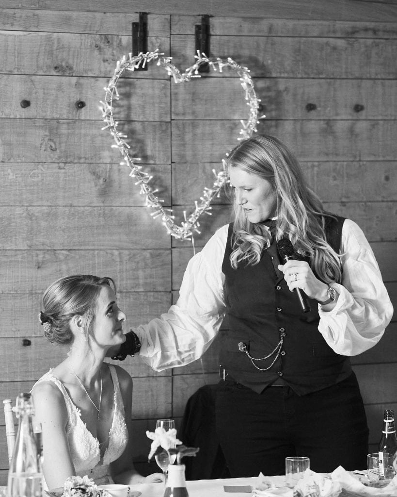 A tender moment as the bride talks about her partner during a Woodhall Spa wedding.