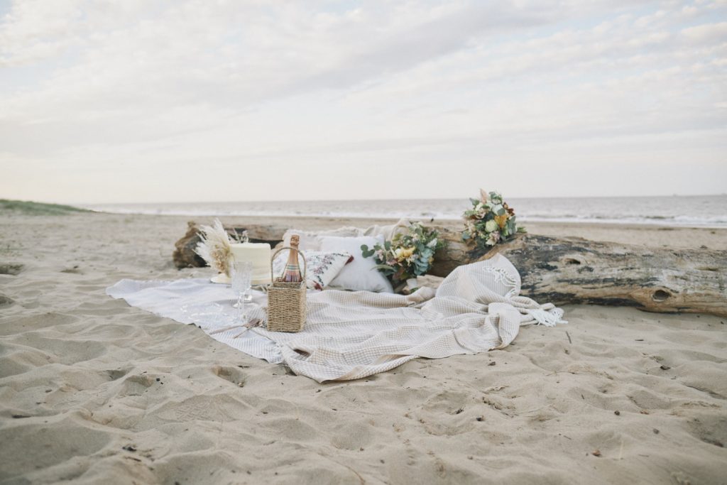 A beautiful picnic on the beach for a wedding reception
